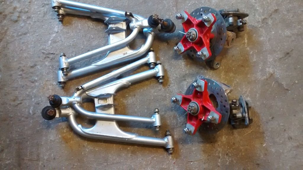 collection of Honda ATV front suspension parts