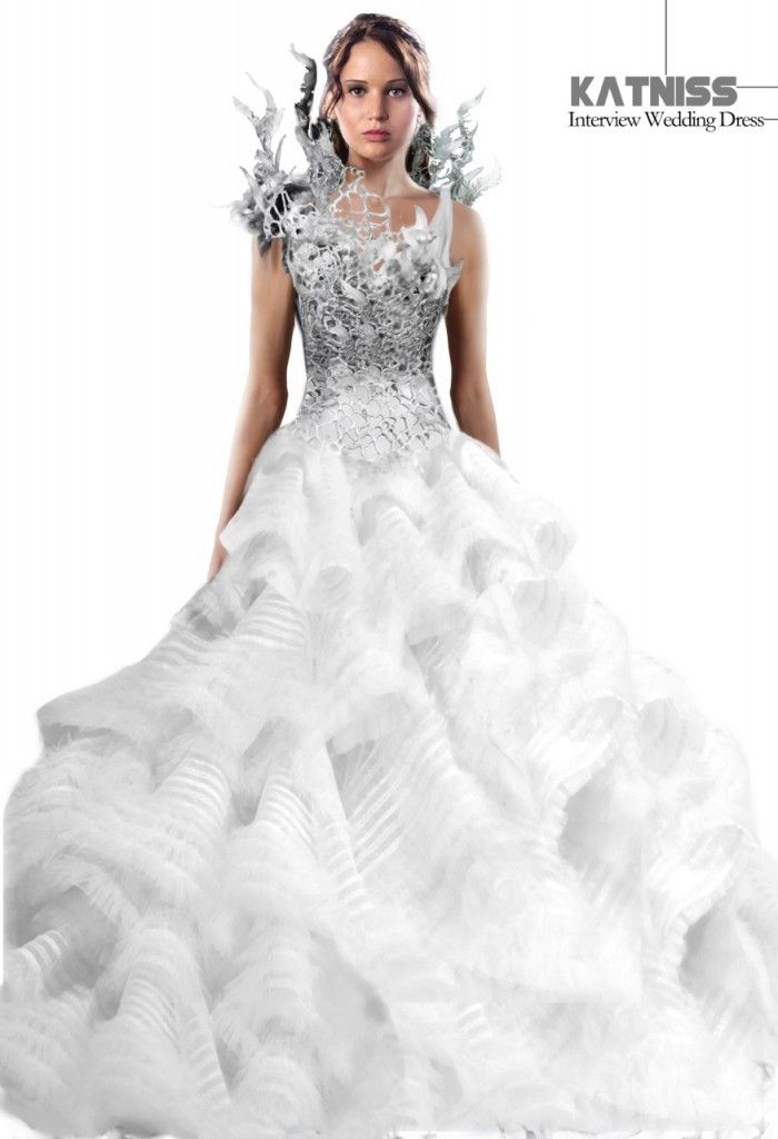 http://i785.photobucket.com/albums/yy139/TheHobOrgNews/Catching%20Fire%20Movie/000_Katniss_Wedding-Dress_correction-700x1024_zps3d162a30.jpeg