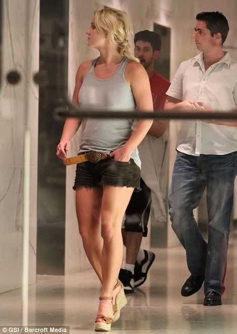 Britney looks slightly concerned as she visits Jason in Beverly Hills